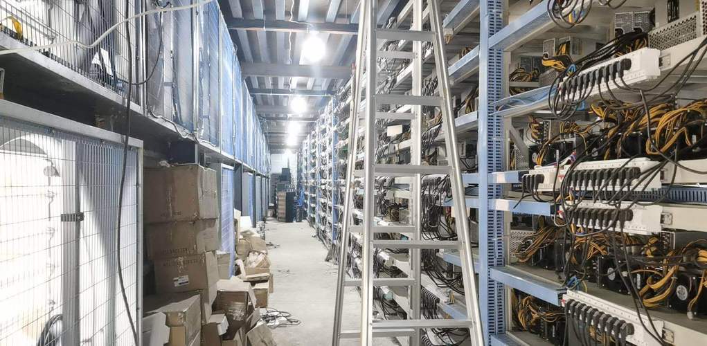 An intricate view of a modern mining rig setup, highlighting sustainable components in a British hosting environment